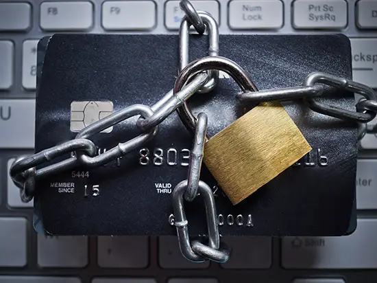 Image of a credit card with chains and a lock