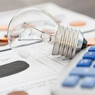 Image of a lightbulb on an energy bill